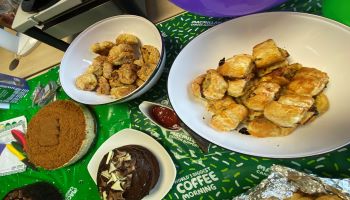 COFFEE WAS POURED AND CAKE WAS EATEN RAISING MONEY FOR MACMILLIAN CANCER SUPPORT CHARITY 